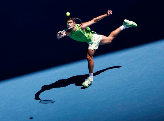 (260121) -- MELBOURNE, Jan. 21, 2026 -- Carlos Alcaraz of Spain hits a return during the men s singles 2nd round match against Yannick Hanfmann of Germany at the Australian Open tennis tournament in Melbourne, Australia, Jan. 21, 2026. ) (SP)AUSTRALIA-MELBOURNE-TENNIS-AUSTRALIAN OPEN-MEN S SINGLES-DAY 4 MaxPing 