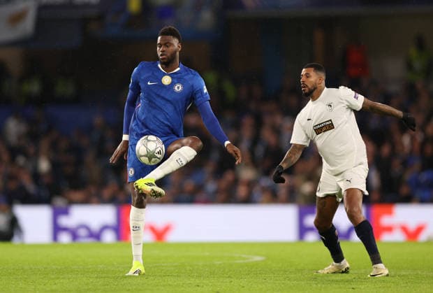 London, England, 21st January 2026. Benoit Badiashile of Chelsea (L) clears from Derrick Luckassen of Pafos FC during the Chelsea vs Pafos FC UEFA Champions League match at Stamford Bridge, London. Picture credit should read: David Klein Sportimage EDITORIAL USE ONLY. No use with unauthorised audio, video, data, fixture lists, club league logos or live services. Online in-match use limited to 120 images, no video emulation. No use in betting, games or single club league player publications. SPI_013_DK_CHELSEA_PAFOS SPI-4466-0013