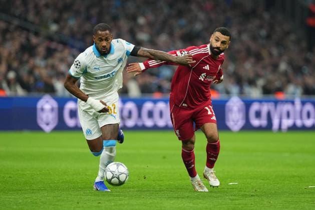 Mohamed Salah of Liverpool battles with Michael Murillo of Marseille Marseille v Liverpool, UEFA Champions League, Group Stage, Football, Orange Velodrome, Marseille, France - 21 Jan 2026Marseille Orange Vélodrome France EDITORIAL USE ONLY No use with unauthorised audio, video, data, fixture lists, club league logos or live services. Online in-match use limited to 120 images, no video emulation. No use in betting, games or single club league player publications. Copyright: xDavexWinter Shutterstockx 16348361bj