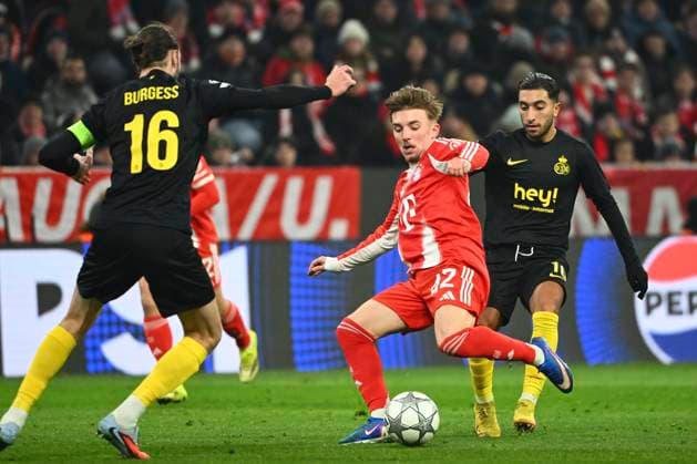 Bayern Munchen v Royale Union Saint-Gilloise - UEFA Champions League MUNICH, GERMANY - JANUARY 21 : Burgess Christian defender of Union Saint-Gilloise, Karl Lennart midfielder of Bayern Munchen, Ait El Hadj Anouar midfielder of Union Saint-Gilloise during the UEFA Champions League 2025 26 League Phase MD7 match between FC Bayern Munchen and Royale Union Saint-Gilloise on January 21, 2026 in Munich, Germany, 21 01 2026 Munich Germany  Copyright: xVincentxKalutx