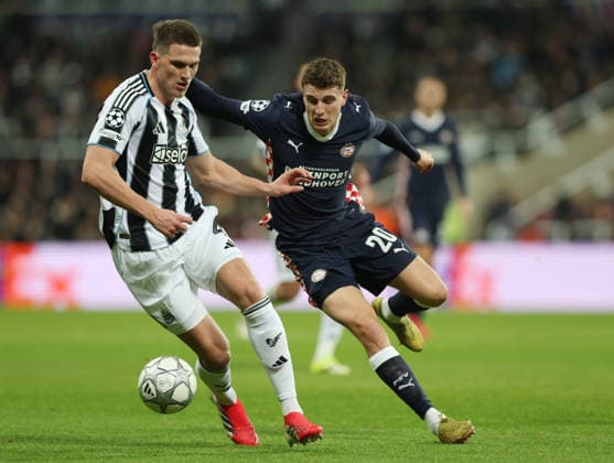 Newcastle Upon Tyne, England, 21st January 2026. Sven Botman of Newcastle United and Guus Til of PSV Eindhoven during the Newcastle United vs PSV Eindhoven UEFA Champions League match at St. James Park, Newcastle Upon Tyne. Picture credit should read: Nigel Roddis Sportimage EDITORIAL USE ONLY. No use with unauthorised audio, video, data, fixture lists, club league logos or live services. Online in-match use limited to 120 images, no video emulation. No use in betting, games or single club league player publications. SPI_027_NR_NEWC_PSV SPI-4467-0028