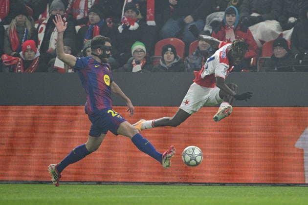 Eric Gercia of Barcelona, left, and Youssoupha Sanyang of Slavia in action during the Champions League 7th round match Slavia Praha vs FC Barcelona, Barca in Pilsen, Czech Republic, January 21, 2026. (CTKxPhoto VitxSimanek) CTKPhotoP2026012110048  CTKPhotoP2026012110048