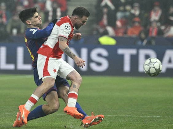 Gerard Martin of Barcelona, left, and Vasil Kusej of Slavia in action during the Champions League 7th round match Slavia Praha vs FC Barcelona, Barca in Pilsen, Czech Republic, January 21, 2026. (CTKxPhoto MichalxKrumphanzl) CTKPhotoP2026012110084  CTKPhotoP2026012110084