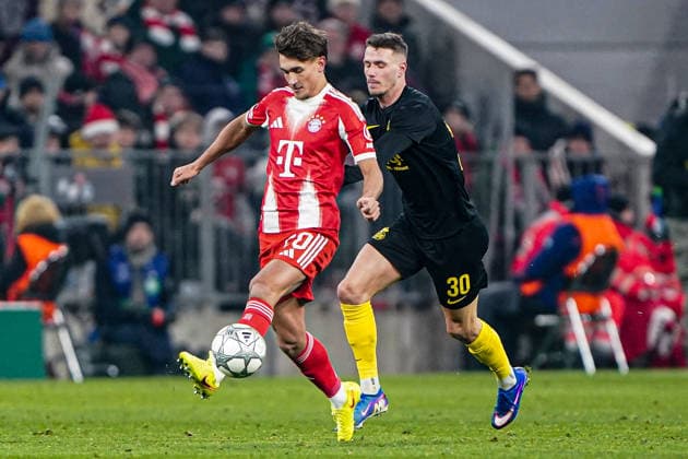 2026-01-21 FC Bayern München v R. Union Saint-Gilloise - UEFA Champions League 2025 26 League Phase MD7 MUNICH, GERMANY - JANUARY 21: Tom Bischof of FC Bayern M++nchen, Raul Florucz of R. Union Saint-Gilloise battle for the ball during the UEFA Champions League 2025 26 League Phase MD7 match between FC Bayern M++nchen and R. Union Saint-Gilloise at Football Arena Munich on January 21, 2026 in Munich, Germany. Munich Football Arena Munich Germany Content not available for redistribution in The Netherlands directly or indirectly through any third parties. Copyright: xAndrexWeeningx