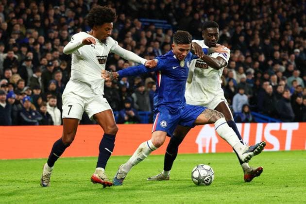 Enzo Fernandez of Chelsea under pressure from Bruno of Pafos and Derrick Luckassen of Pafos Chelsea v Pafos, UEFA Champions League, Group Stage, Football, Stamford Bridge, London, UK - 21 Jan 2026London Stamford Bridge United Kingdom EDITORIAL USE ONLY No use with unauthorised audio, video, data, fixture lists, club league logos or live services. Online in-match use limited to 120 images, no video emulation. No use in betting, games or single club league player publications. Copyright: xSimonxDael Shutterstockx 16348356ad