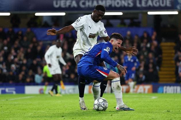 Enzo Fernandez of Chelsea fouled by Derrick Luckassen of Pafos Chelsea v Pafos, UEFA Champions League, Group Stage, Football, Stamford Bridge, London, UK - 21 Jan 2026London Stamford Bridge United Kingdom EDITORIAL USE ONLY No use with unauthorised audio, video, data, fixture lists, club league logos or live services. Online in-match use limited to 120 images, no video emulation. No use in betting, games or single club league player publications. Copyright: xSimonxDael Shutterstockx 16348356y
