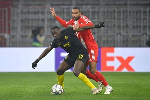Jonathan TAH Bayern Muenchen , action,duel against Promise DAVID Saint Gilloise Football Champions League,season 2025 26, league phase FC Bayern Muenchen Royale Union Saint Gilloise on 21 01 2026