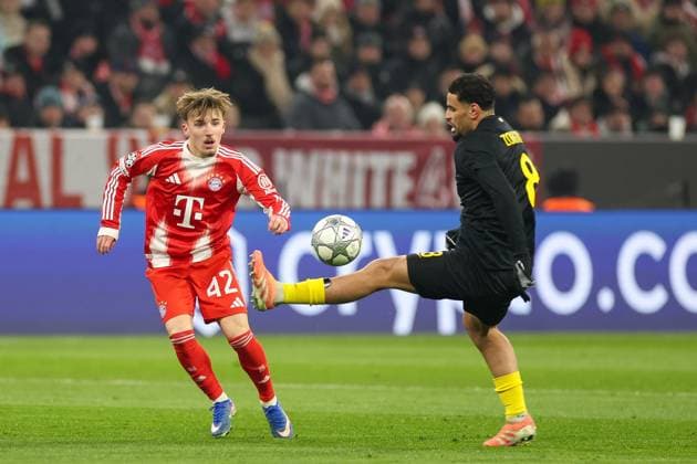 in duel, action, with Lennart Karl 42 FC Bayern Muenchen , Adem Zorgane 8 Royale Union Saint Gilloise , FC Bayern Muenchen vs Royale Union Saint Gilloise, Soccer, Champions League, Matchday 7, 21 01 2026 Muenchen Bayern Germany Copyright: xkolbert-press ChristianxKolbertx