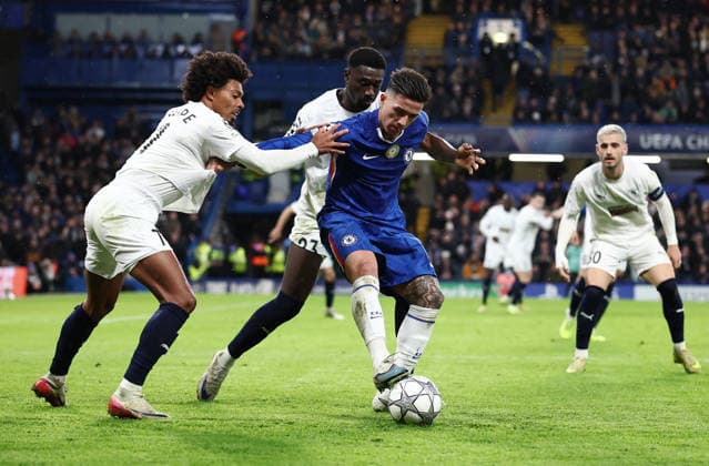 London, England, 21st January 2026. Enzo Fernandez of Chelsea (C) is challenged by Bruno of Pafos FC (L) and Derrick Luckassen of Pafos FC during the Chelsea vs Pafos FC UEFA Champions League match at Stamford Bridge, London. Picture credit should read: David Klein Sportimage EDITORIAL USE ONLY. No use with unauthorised audio, video, data, fixture lists, club league logos or live services. Online in-match use limited to 120 images, no video emulation. No use in betting, games or single club league player publications. SPI_034_DK_CHELSEA_PAFOS SPI-4466-0034
