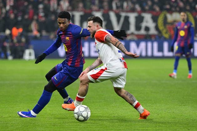 Alejandro Balde of Barcelona, left, and Vasil Kusej of Slavia in action during the Champions League 7th round match Slavia Praha vs FC Barcelona, Barca in Pilsen, Czech Republic, January 21, 2026. (CTKxPhoto VitxSimanek) CTKPhotoP2026012110581  CTKPhotoP2026012110581