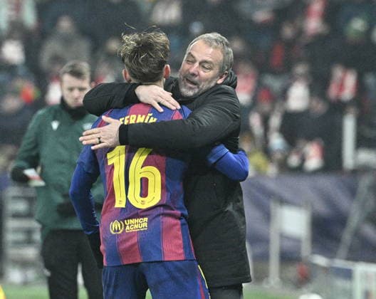 Fermin Lopez of Barcelona, left, and coach Hansi Flick celebrate a goal during the Champions League 7th round match Slavia Praha vs FC Barcelona, Barca in Pilsen, Czech Republic, January 21, 2026. (CTKxPhoto MichalxKrumphanzl) CTKPhotoP2026012110705  CTKPhotoP2026012110705