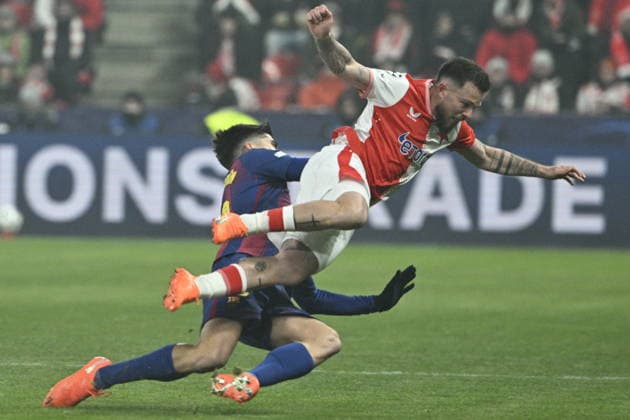Gerard Martin of Barcelona, left, and Vasil Kusej of Slavia in action during the Champions League 7th round match Slavia Praha vs FC Barcelona, Barca in Pilsen, Czech Republic, January 21, 2026. (CTKxPhoto MichalxKrumphanzl) CTKPhotoP2026012110707  CTKPhotoP2026012110707