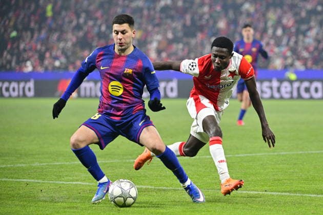 Roony Bardghji of Barcelona, left, and Lukas Provod of Slavia in action during the Champions League 7th round match Slavia Praha vs FC Barcelona, Barca in Pilsen, Czech Republic, January 21, 2026. (CTKxPhoto VitxSimanek) CTKPhotoP2026012110788  CTKPhotoP2026012110788