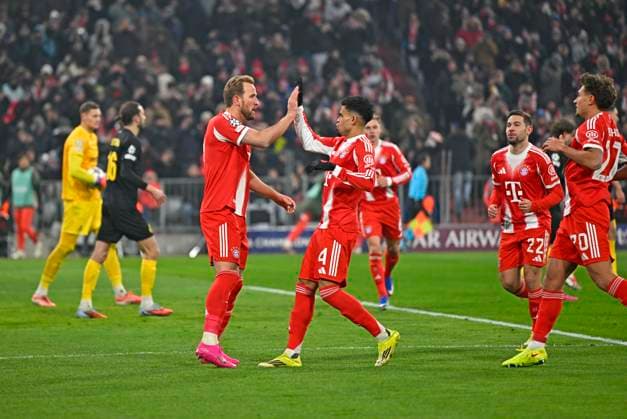 21 01 2026, Football UEFA Championsleague 2025 2026 Preliminary Round 7 Matchday, FC Bayern Munich Union Saint Gilloise, in the Allianz Arena Munich Trojubles f l Harry Kane FC Bayern Munich , Jonathan Tah FC Bayern Munich , Raphael Guerreiro FC Bayern Munich and Tom Bischof Bayern Munich DFL and DFB regulations prohibit any use of photographs as image sequences and or quasi video