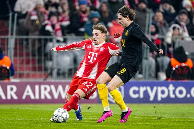 2026-01-21 FC Bayern München v R. Union Saint-Gilloise - UEFA Champions League 2025 26 League Phase MD7 MUNICH, GERMANY - JANUARY 21: Lennart Karl of FC Bayern Munchen, Kamiel Van De Perre of R. Union Saint-Gilloise battle for the ball during the UEFA Champions League 2025 26 League Phase MD7 match between FC Bayern M++nchen and R. Union Saint-Gilloise at Football Arena Munich on January 21, 2026 in Munich, Germany. Munich Football Arena Munich Germany Content not available for redistribution in The Netherlands directly or indirectly through any third parties. Copyright: xAndrexWeeningx
