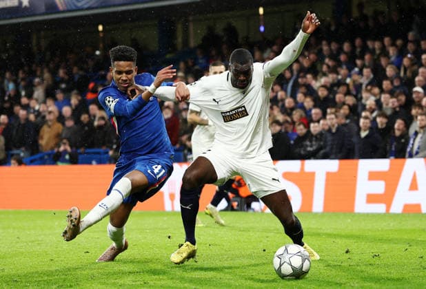 London, England, 21st January 2026. Ken Sema of Pafos FC (R) is challenged by Estevao of Chelsea during the Chelsea vs Pafos FC UEFA Champions League match at Stamford Bridge, London. Picture credit should read: David Klein Sportimage EDITORIAL USE ONLY. No use with unauthorised audio, video, data, fixture lists, club league logos or live services. Online in-match use limited to 120 images, no video emulation. No use in betting, games or single club league player publications. SPI_040_DK_CHELSEA_PAFOS SPI-4466-0040