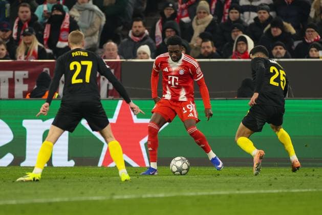 in duel, action, with Louis Patris 27 Royale Union Saint Gilloise , Alphonso Davies 19 FC Bayern Muenchen , Anan Khalaili 25 Royale Union Saint Gilloise , FC Bayern Muenchen vs Royale Union Saint Gilloise, Soccer, Champions League, Matchday 7, 21 01 2026 Muenchen Bayern Germany Copyright: xkolbert-press ChristianxKolbertx