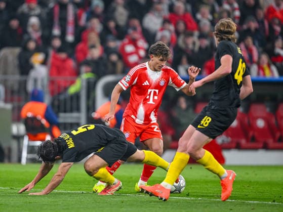 Kevin Mac Allister R Union Saint Gilloise , Tom Bischof FC Bayern München and Fedde Leysen R Union Saint Gilloise battle for the ball during the UEFA Champions League 2025 26 League Phase MD7 match between FC Bayern München and R Union Saint Gilloise at Football Arena Munich on January 21, 2026 in Munich, Germany Photo by Harry Langer DeFodi Images
