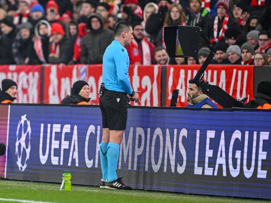 Referee Rade Obrenovic looks at VAR during the UEFA Champions League 2025 26 League Phase MD7 match between FC Bayern München and R Union Saint Gilloise at Football Arena Munich on January 21, 2026 in Munich, Germany Photo by Harry Langer DeFodi Images