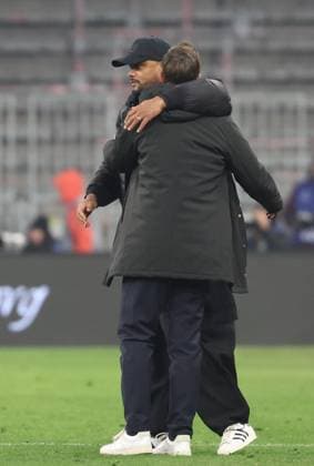 Bayern s head coach Vincent Kompany and Union s head coach David Hubert pictured after a soccer game between German FC Bayern Munich and Belgian Royale Union Saint-Gilloise, on Wednesday 21 January 2026 in Munich, on the seventh day of the League phase of the UEFA Champions League tournament. VIRGINIExLEFOUR  x157575562x