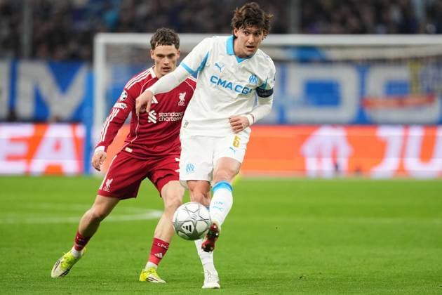 Leonardo Balerdi of Marseille holds off Florian Wirtz of Liverpool Marseille v Liverpool, UEFA Champions League, Group Stage, Football, Orange Velodrome, Marseille, France - 21 Jan 2026Marseille Orange Vélodrome France EDITORIAL USE ONLY No use with unauthorised audio, video, data, fixture lists, club league logos or live services. Online in-match use limited to 120 images, no video emulation. No use in betting, games or single club league player publications.  Copyright: xDavexWinter Shutterstockx 16348361ji