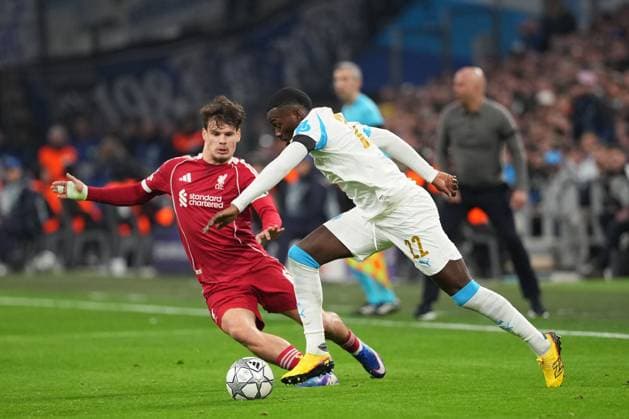 Timothy Weah of Marseille takes on Milos Kerkez of Liverpool Marseille v Liverpool, UEFA Champions League, Group Stage, Football, Orange Velodrome, Marseille, France - 21 Jan 2026Marseille Orange Vélodrome France EDITORIAL USE ONLY No use with unauthorised audio, video, data, fixture lists, club league logos or live services. Online in-match use limited to 120 images, no video emulation. No use in betting, games or single club league player publications.  Copyright: xDavexWinter Shutterstockx 16348361ja