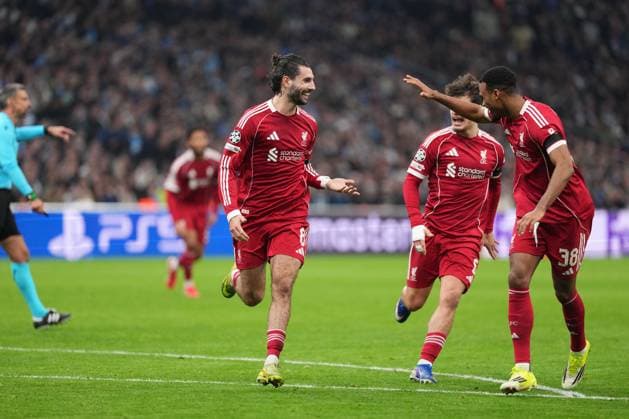 Dominik Szoboszlai of Liverpool celebrates with Ryan Gravenberch of Liverpool and Milos Kerkez of Liverpool after he puts his side 1-0 ahead with a free kick just before half-time Marseille v Liverpool, UEFA Champions League, Group Stage, Football, Orange Velodrome, Marseille, France - 21 Jan 2026Marseille Orange Vélodrome France EDITORIAL USE ONLY No use with unauthorised audio, video, data, fixture lists, club league logos or live services. Online in-match use limited to 120 images, no video emulation. No use in betting, games or single club league player publications.  Copyright: xDavexWinter Shutterstockx 16348361kx