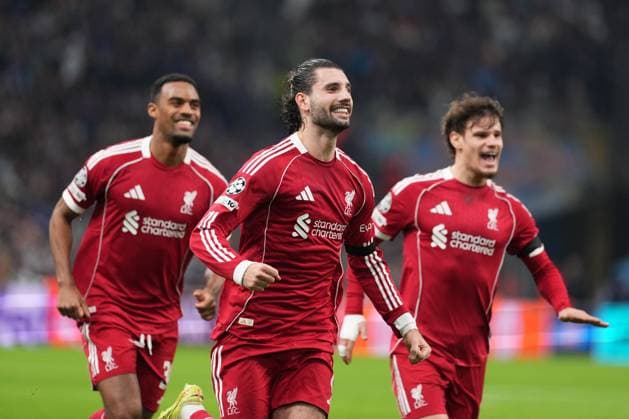 Dominik Szoboszlai of Liverpool celebrates with Ryan Gravenberch of Liverpool and Milos Kerkez of Liverpool after he puts his side 1-0 ahead with a free kick just before half-time Marseille v Liverpool, UEFA Champions League, Group Stage, Football, Orange Velodrome, Marseille, France - 21 Jan 2026Marseille Orange Vélodrome France EDITORIAL USE ONLY No use with unauthorised audio, video, data, fixture lists, club league logos or live services. Online in-match use limited to 120 images, no video emulation. No use in betting, games or single club league player publications.  Copyright: xDavexWinter Shutterstockx 16348361le