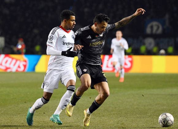 (260122) -- BAKU, Jan. 22, 2026 -- Qarabag s Matheus Silva (R) vies with Frankfurt s Ansgar Knauff during the UEFA Champions League match between Qarabag and Frankfurt at the Tofiq Bahramov Republican Stadium in Baku, Azerbaijan, Jan. 21, 2026. (Photo by Xinhua) (SP)AZERBAIJAN-BAKU-FOOTBALL-UEFA CHAMPIONS LEAGUE-QARABAG VS FRANKFURT TofikxBabayev 