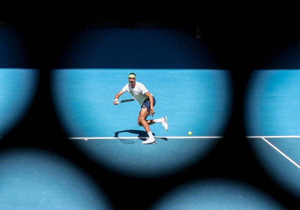 (260122) -- MELBOURNE, Jan. 22, 2026 -- Lorenzo Sonego of Italy hits a return during the men s singles 2nd round match against Lorenzo Musetti of Italy at the Australian Open tennis tournament in Melbourne, Australia, Jan. 22, 2026. ) (SP)AUSTRALIA-MELBOURNE-TENNIS-AUSTRALIAN OPEN-MEN S SINGLES MaxPing 