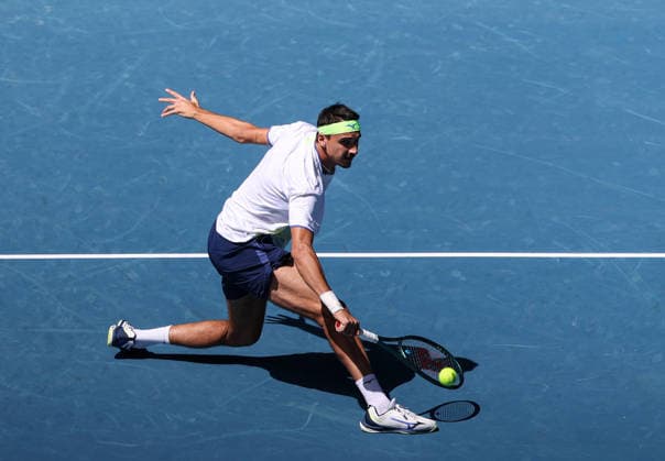(260122) -- MELBOURNE, Jan. 22, 2026 -- Lorenzo Sonego of Italy hits a return during the men s singles 2nd round match against Lorenzo Musetti of Italy at the Australian Open tennis tournament in Melbourne, Australia, Jan. 22, 2026. ) (SP)AUSTRALIA-MELBOURNE-TENNIS-AUSTRALIAN OPEN-MEN S SINGLES MaxPing 