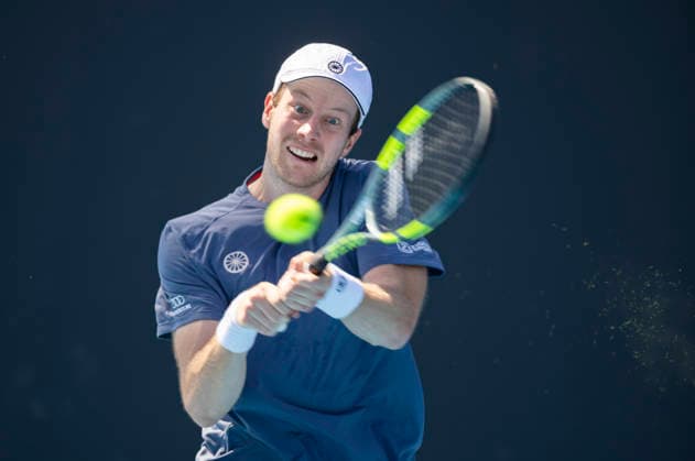 (260122) -- MELBOURNE, Jan. 22, 2026 -- Botic Van de Zandschulp of the Netherlands hits a return during the men s singles 2nd round match against Shang Juncheng of China at the Australian Open tennis tournament in Melbourne, Australia, Jan. 22, 2026. (Photo by Xinhua) (SP)AUSTRALIA-MELBOURNE-TENNIS-AUSTRALIAN OPEN-MEN S SINGLES HuxJingchen 