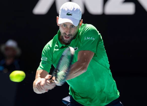 (260122) -- MELBOURNE, Jan. 22, 2026 -- Novak Djokovic hits a return during the men s singles 2nd round match between Novak Djokovic of Serbia and Francesco Maestrelli of Italy at the Australian Open tennis tournament in Melbourne, Australia, Jan. 22, 2026. (Photo by Xinhua) (SP)AUSTRALIA-MELBOURNE-TENNIS-AUSTRALIAN OPEN-MEN S SINGLES HuxJingchen 