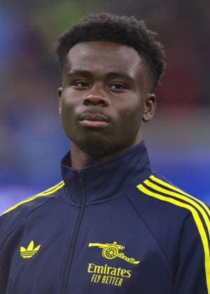 Milan, Italy, 20th January 2026. Bukayo Saka of Arsenal FC looks on during the line up prior to the Internazionale vs Arsenal UEFA Champions League match at Giuseppe Meazza, Milan. Picture credit should read: Jonathan Moscrop Sportimage EDITORIAL USE ONLY. No use with unauthorised audio, video, data, fixture lists, club league logos or live services. Online in-match use limited to 120 images, no video emulation. No use in betting, games or single club league player publications. SPI_125_JM_INTER_ARSENAL_UCL SPI-4421-0125