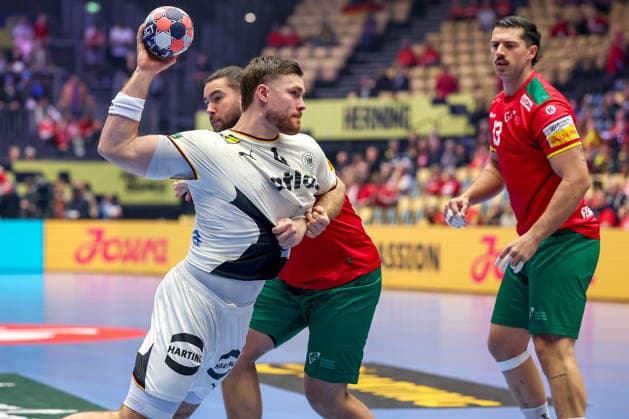22 01 2026, Handball, Men s EHF EURO 2026, Germany Portugal, Jyske Bank Boxing in Herning, Denmark, Main Round Johannes Golla Germany 04 in duel against Luis Diogo Sousa Frade Portugal 82 Denmark