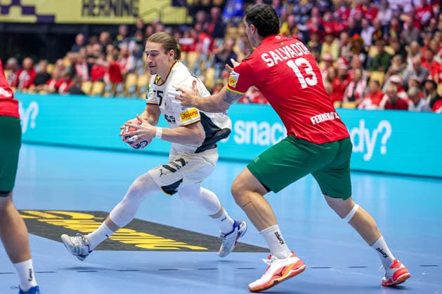 22 01 2026, Handball, Men s EHF EURO 2026, Germany Portugal, Jyske Bank Boxing in Herning, Denmark, Main Round Juri Knorr Germany 15 in duel against Rocha Nogueira Portugal 13 Denmark