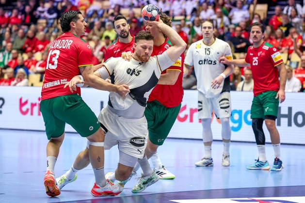 22 01 2026, Handball, Men s EHF EURO 2026, Germany Portugal, Jyske Bank Boxing in Herning, Denmark, Main Round Johannes Golla Germany 04 in duel against Rocha Nogueira Portugal 13 Gabriel Oliveira Cavalcanti Portugal 95 Denmark