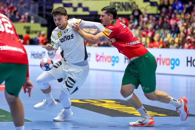 22 01 2026, Handball, Men s EHF EURO 2026, Germany Portugal, Jyske Bank Boxing in Herning, Denmark, Main Round Marko Grgic Germany 71 in duel against Rocha Nogueira Portugal 13 Denmark