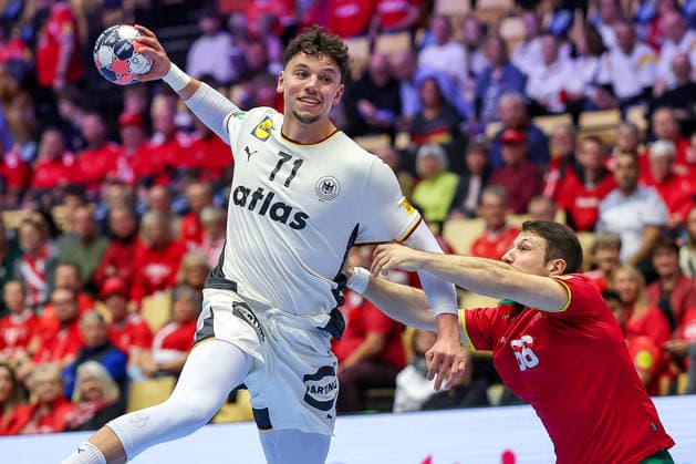 22 01 2026, Handball, Men s EHF EURO 2026, Germany Portugal, Jyske Bank Boxing in Herning, Denmark, Main Round Marko Grgic Germany 71 in a duel against Joao Pedro Vinhas Silva Gomes Portugal 66 Denmark