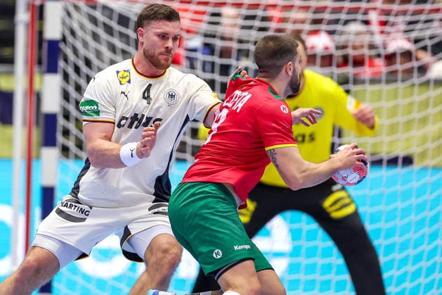 22 01 2026, Handball, Men s EHF EURO 2026, Germany Portugal, Jyske Bank Boxing in Herning, Denmark, Main Round Johannes Golla Germany 04 in duel against Filipe Graca Monteiro Portugal 09 Denmark