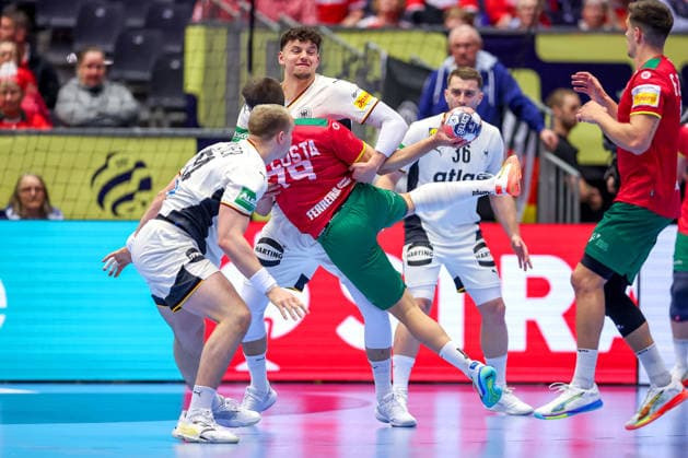 22 01 2026, Handball, Men s EHF EURO 2026, Germany Portugal, Jyske Bank Boxing in Herning, Denmark, Main Round Justus Fischer Germany 54 Marko Grgic Germany 71 Lukas Mertens Germany 36 defend against Martim Mota Costa Portugal 79 Denmark