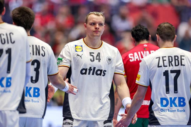 22 01 2026, Handball, Men s EHF EURO 2026, Germany Portugal, Jyske Bank Boxen in Herning, Denmark, Main Round Justus Fischer Germany 54 next to Renars Uscins Germany 23 Lukas Zerbe Germany 17 Denmark
