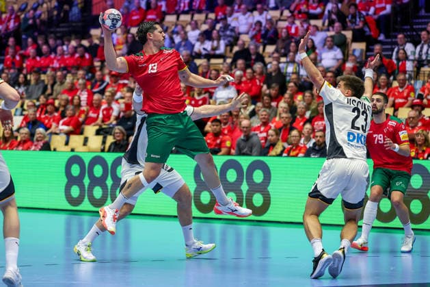 22 01 2026, Handball, Men s EHF EURO 2026, Germany Portugal, Jyske Bank Boxing in Herning, Denmark, Main Round Rocha Nogueira Portugal 13 in duel against Johannes Golla Germany 04 Renars Uscins Germany 23 Denmark