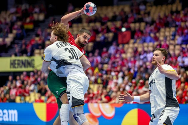 22 01 2026, Handball, Men s EHF EURO 2026, Germany Portugal, Jyske Bank Boxing in Herning, Denmark, Main Round Tom Kiesler Germany 30 in duel against Martim Mota Costa Portugal 79 Denmark