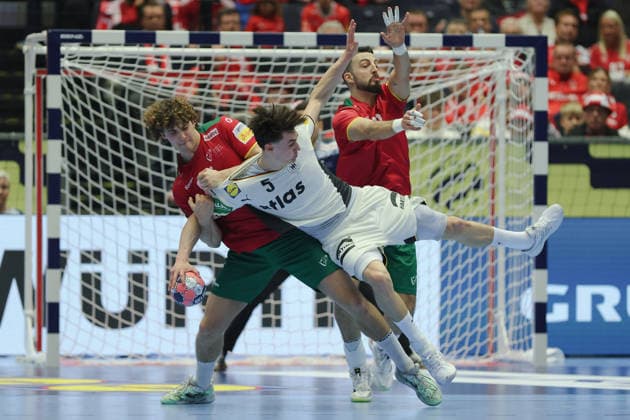 Germany Portugal, EHF Handball European Championship 2026 Gabriel Cavalcant Portugal,95 and Miguel Neves Portugal, 20 defend against Miro Schluroff Germany, 5 Handball EHF European Championship, international match between Germany and Portugal on January 22, 2026 in Herning Denmark , Herning Denmark Jyske Bank Boxen