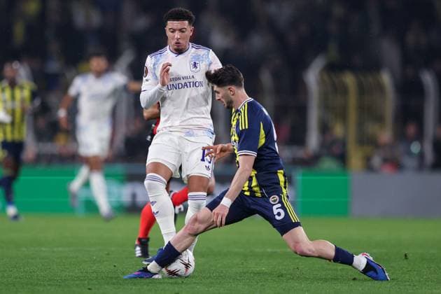 Jadon Sancho of Aston Villa tackled by Ismail Yüksek of Fenerbahce Fenerbache v Aston Villa, UEFA Europa League, Group Stage, Football, Sukru Saracoglu Stadium, Istanbul, Turkiye - 22 Jan 2026Istanbul Sukru Saracoglu Stadium Turkey EDITORIAL USE ONLY No use with unauthorised audio, video, data, fixture lists, club league logos or live services. Online in-match use limited to 120 images, no video emulation. No use in betting, games or single club league player publications. Copyright: xRaddadxJebarah Shutterstockx 16348379bp