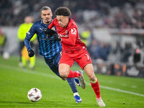 Saied Abu Farchi Maccabi Tel Aviv FC and Derry Scherhant SC Freiburg battle for the ball during the UEFA Europa League 2025 26 League Phase MD7 match between SC Freiburg and Maccabi Tel Aviv FC at Stadion am Wolfswinkel on January 22, 2026 in Freiburg im Breisgau, Germany Photo by Harry Langer DeFodi Images