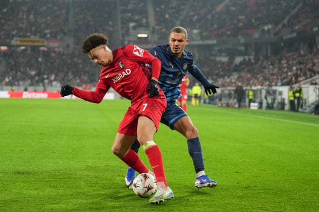 UEFA Europa League SC Freiburg vs Maccabi Tel Aviv, 11 12 2026 Duel between Sayed Abu Farkhi Maccabi Tel Aviv, 34 and Derry Scherhant SC Freiburg, 7 UEFA Europa League SC Freiburg vs Maccabi Tel Aviv, Europa Park Stadium, 11 12 2026 Copyright: xBEAUTIFULxSPORTS Boscox