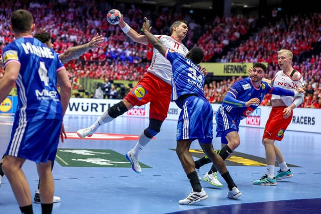 22 01 2026, Handball, Men s EHF EURO 2026, France Denmark, Jyske Bank Boxing in Herning, Denmark, Main Round Rasmus Lauge Schmidt Denmark 11 in duel against Karl Konan France 34 Denmark
