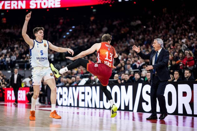 MUNICH, GERMANY - JANUARY 22: Andreas Andi Obst (FC Bayern Muenchen, 13) is being fouled by Sergio De Larrea (Valencia Basket, 5) and sent flying during the Turkish Airlines EuroLeague match between FC Bayern Muenchen vs. Valencia Basket at SAP Garden on round 24 of Turkish Airlines EuroLeague on January 22, 2026 in Munich, Germany. Bavaria Germany Copyright: xSteffiexWunderlx